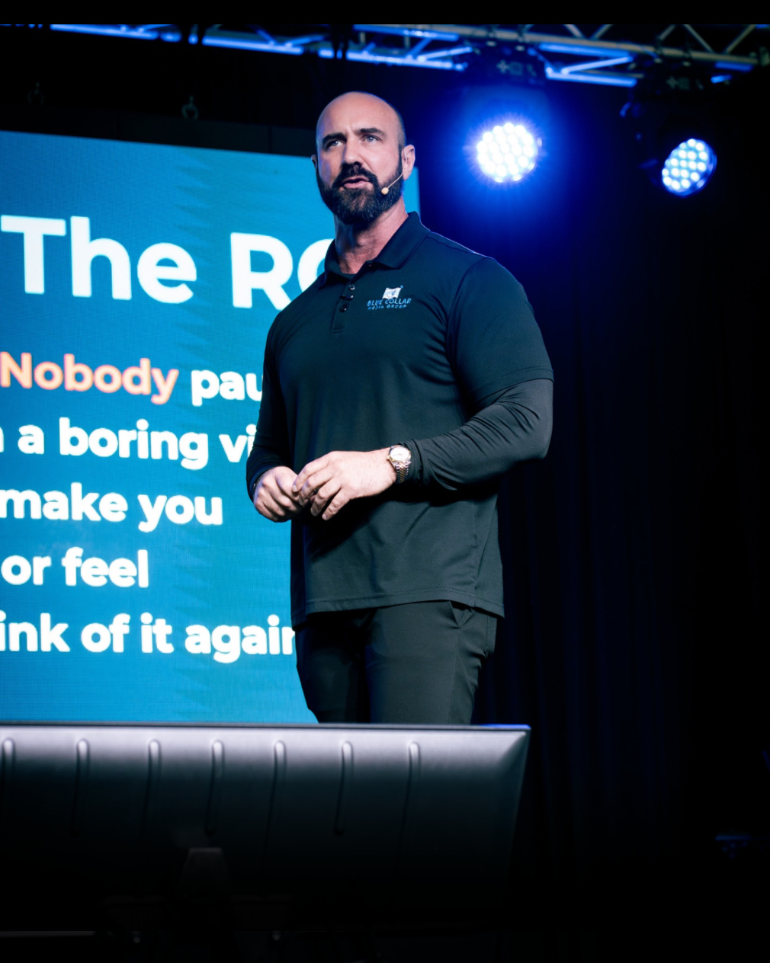 Patrick Carr speaking on stage